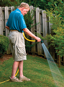 A hand-held hose fitted with a leak free trigger nozzle or a bucket can be used at any time.