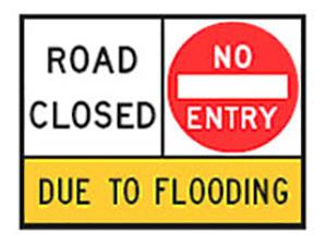 Road closed due to flooding sign